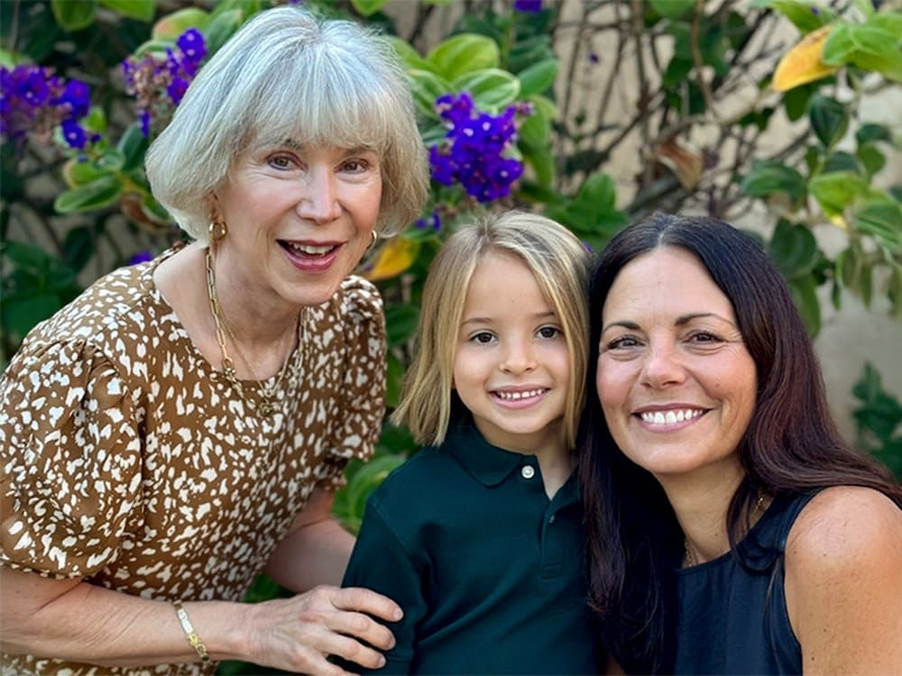Arriving — Kindergarten at Del Mar Pines, founder Judi Panton and Head of School Marci McCord with a student
