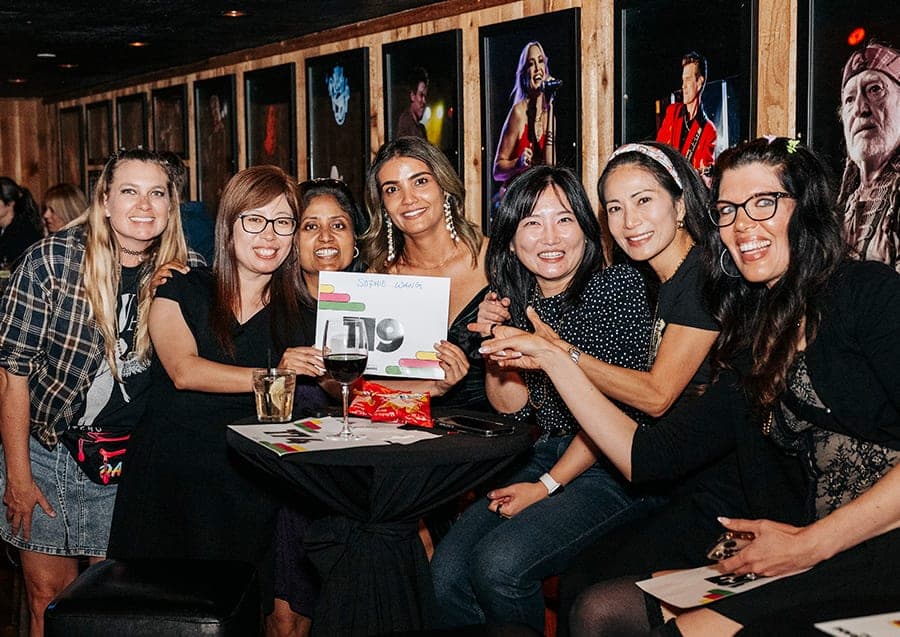 A group of parents celebrating together at the Foundation gala