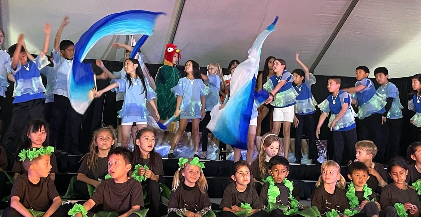 Students performing on stage