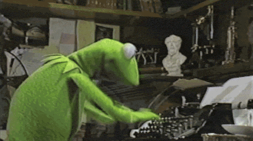 Animated frog typing on a keyboard.