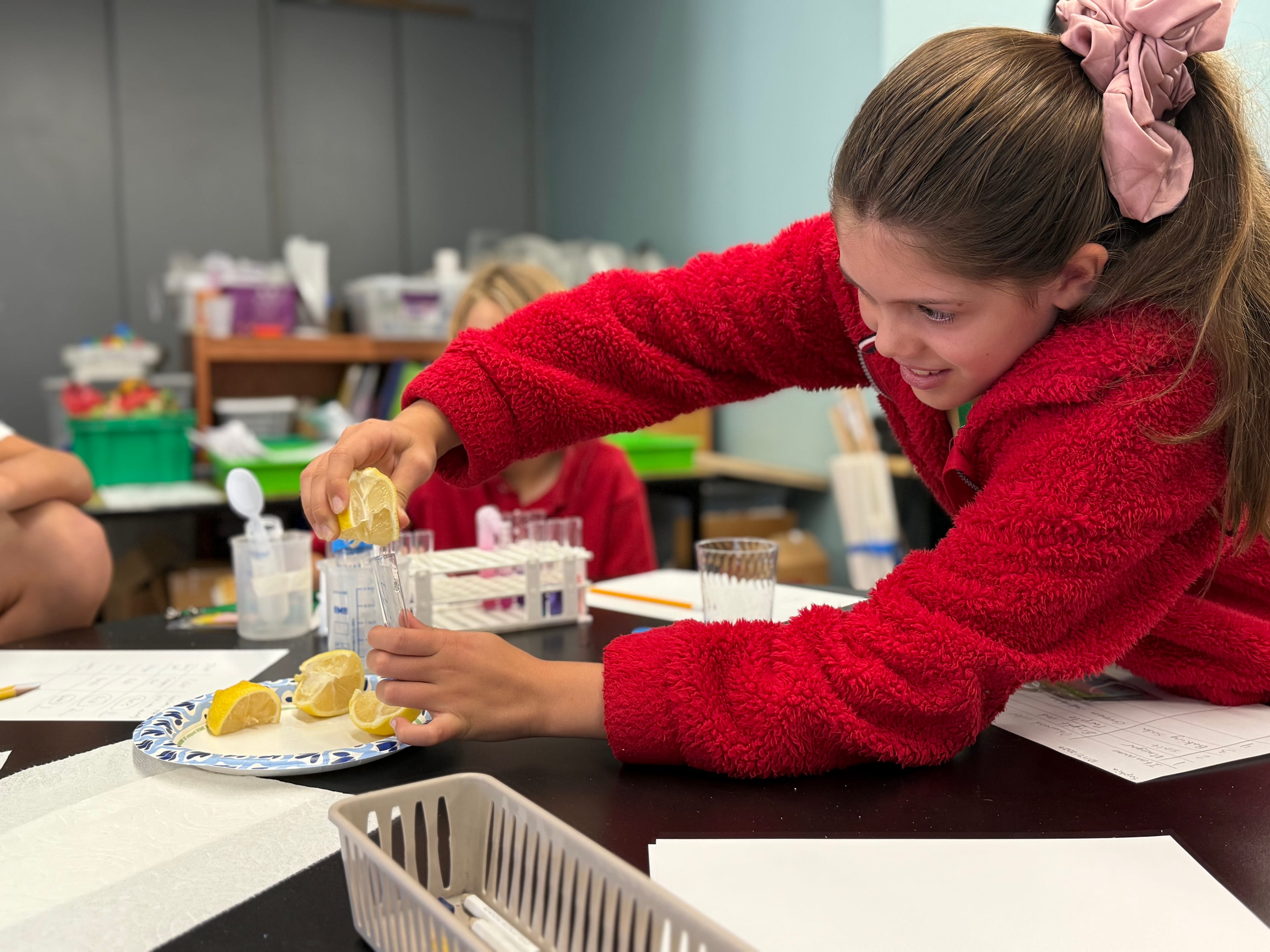 Students exploring hands-on science activities at Del Mar Pines Science Discovery Day.