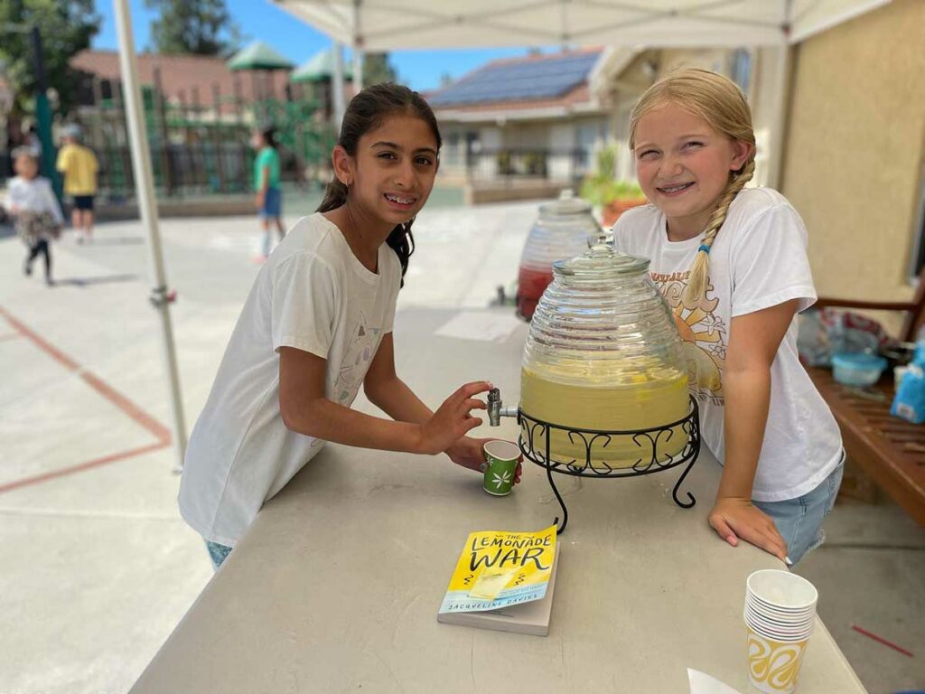 DMP students giving free lemonade
